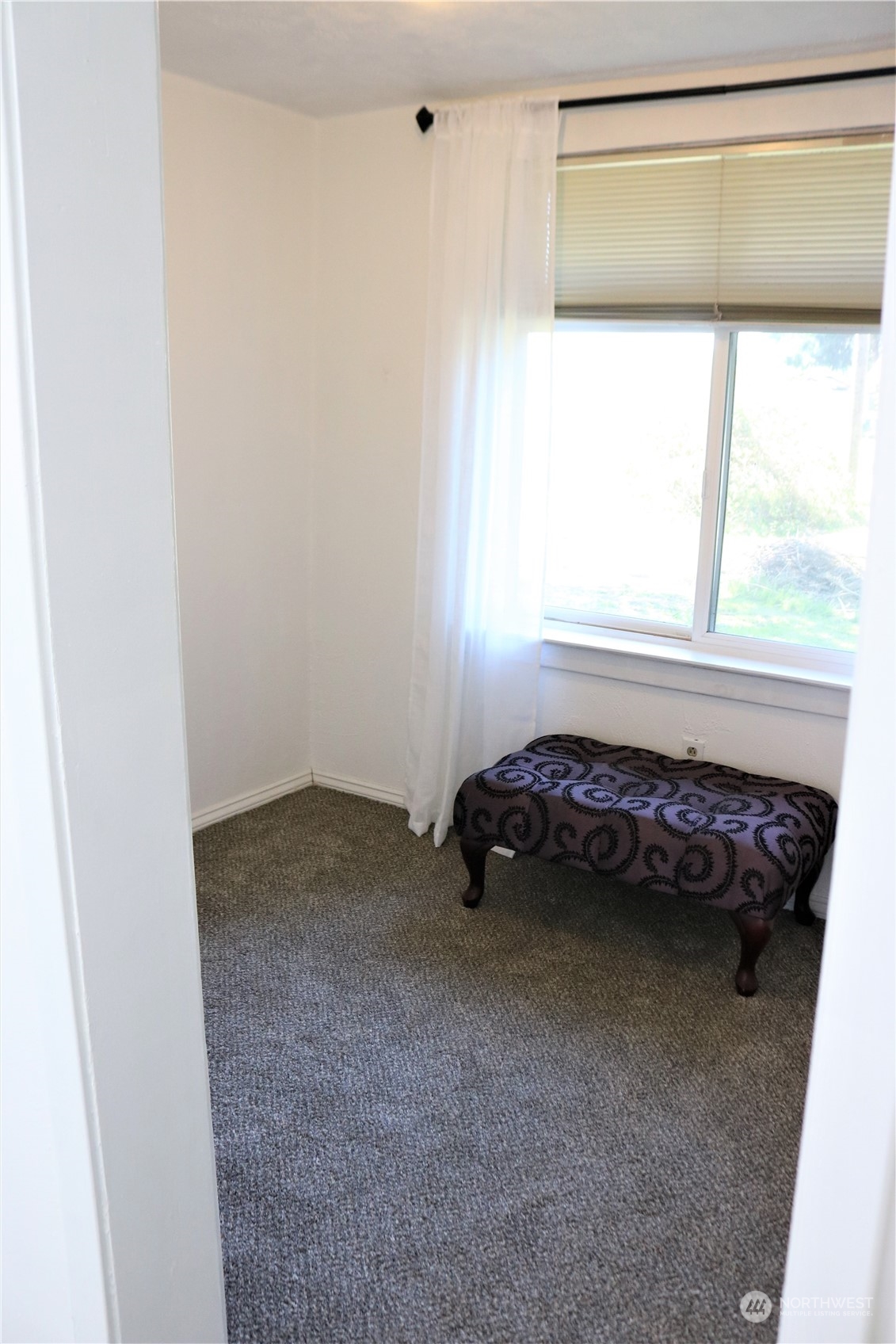 1212 Long Road Centralia, WA 98531 - Photo 37 of 40 a view of a bedroom with a bed and a window