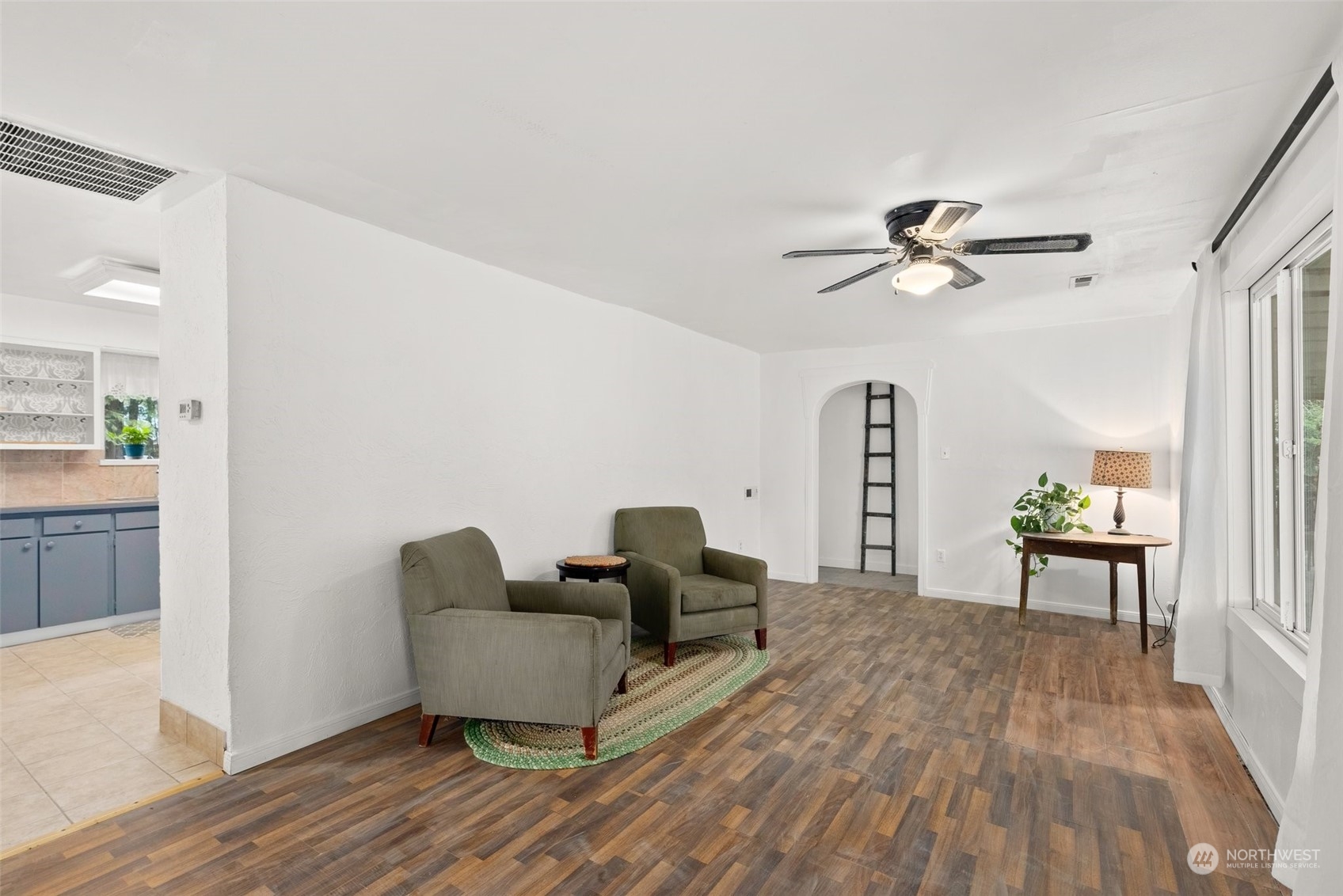 1212 Long Road Centralia, WA 98531 - Photo 9 of 40 a living room with furniture and a wooden floor