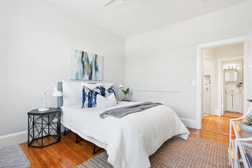 520 Beacon Street, Unit 2F Boston, MA 02215 - Photo 8 of 19 a bedroom with a bed and a table