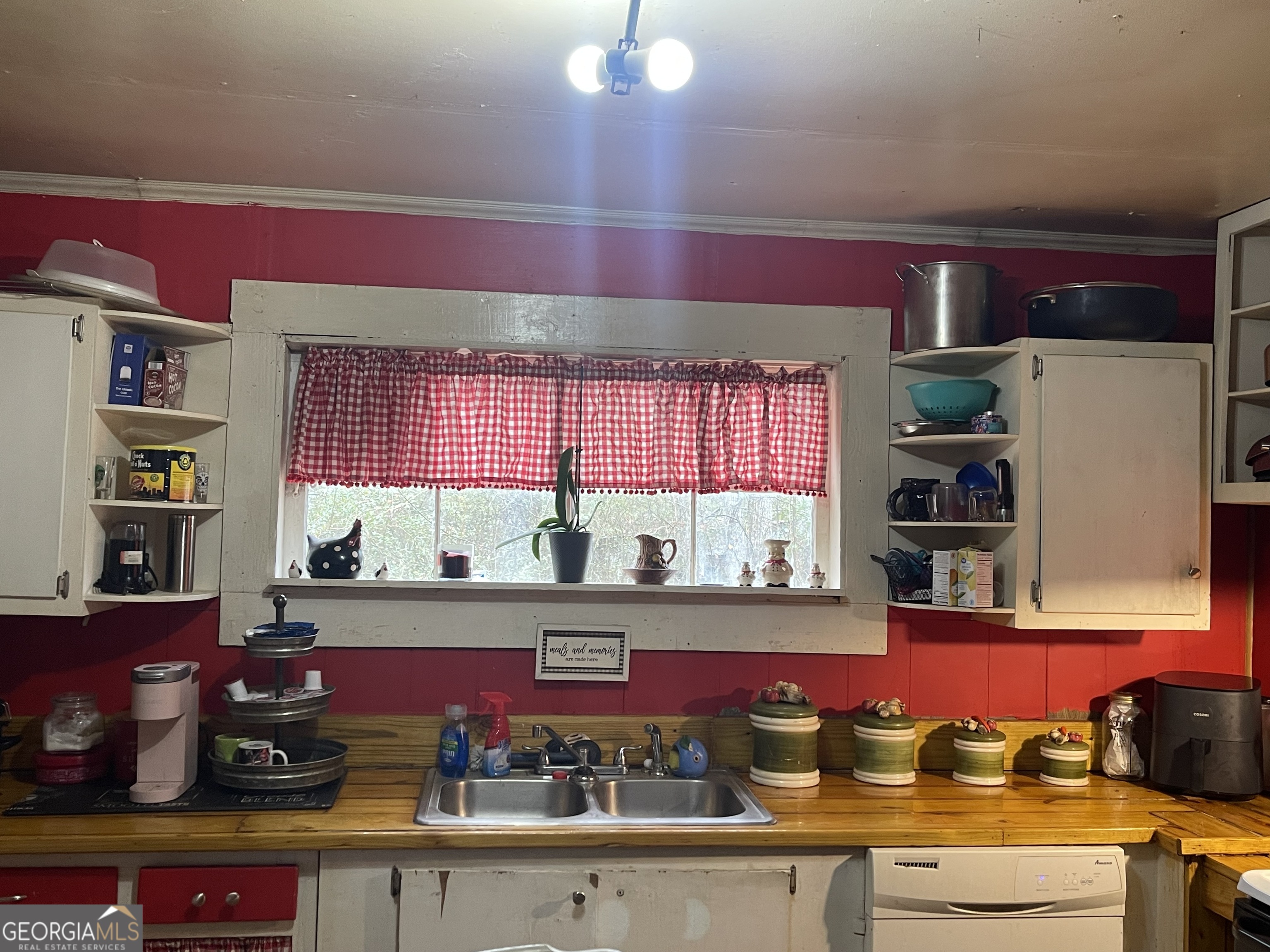 3600 Highway 19 Zebulon, GA 30295 - Photo 6 of 10 a kitchen with stainless steel appliances kitchen island granite countertop a stove and cabinets