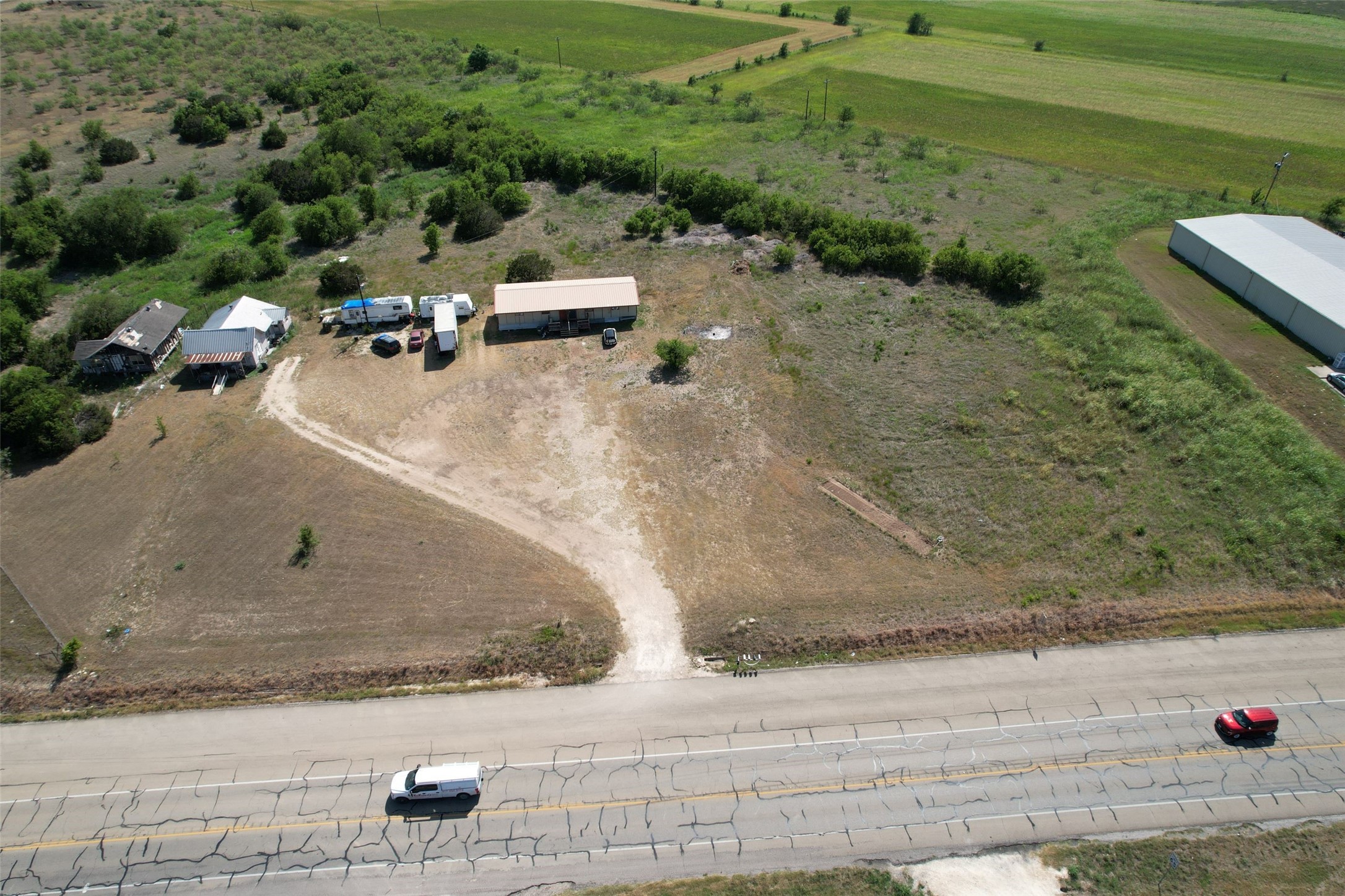 Undisclosed Address Temple, TX 76502 - Photo 3 of 16 an aerial view of a yard with beach