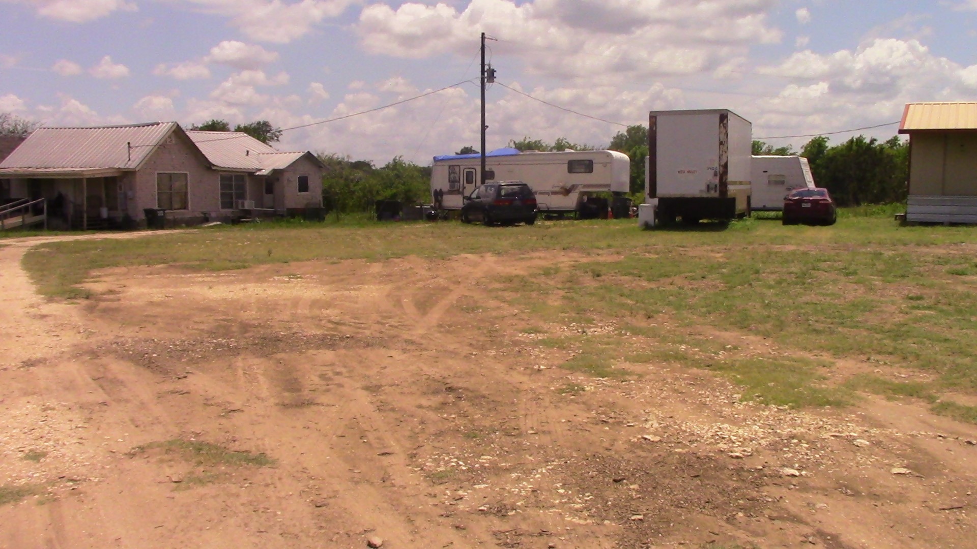 Undisclosed Address Temple, TX 76502 - Photo 4 of 16 a view of a house with a big yard and large trees