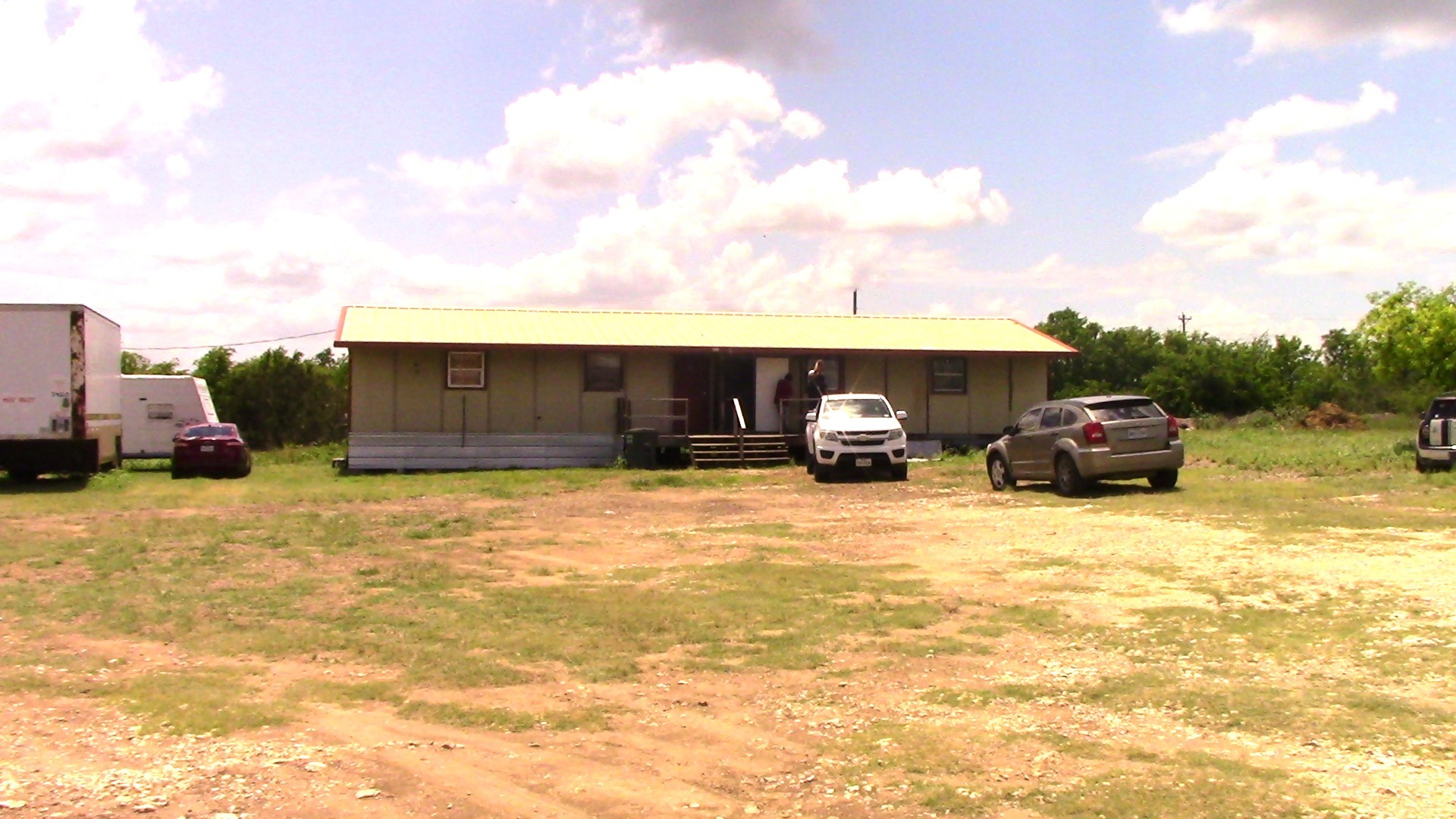Undisclosed Address Temple, TX 76502 - Photo 5 of 16 a car parked in front of a house with a yard