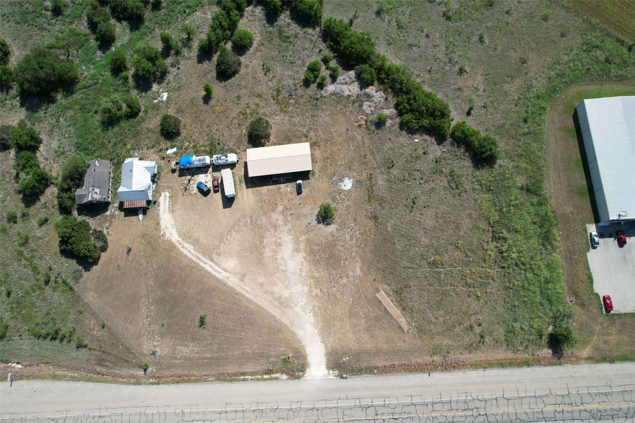 Undisclosed Address Temple, TX 76502 - Photo 8 of 16 an aerial view of a house with a yard