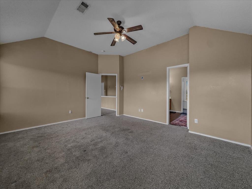 1119 Gaines Mills Road Grand Prairie, TX 75052 - Photo 14 of 29 an empty room with closet and ceiling fan