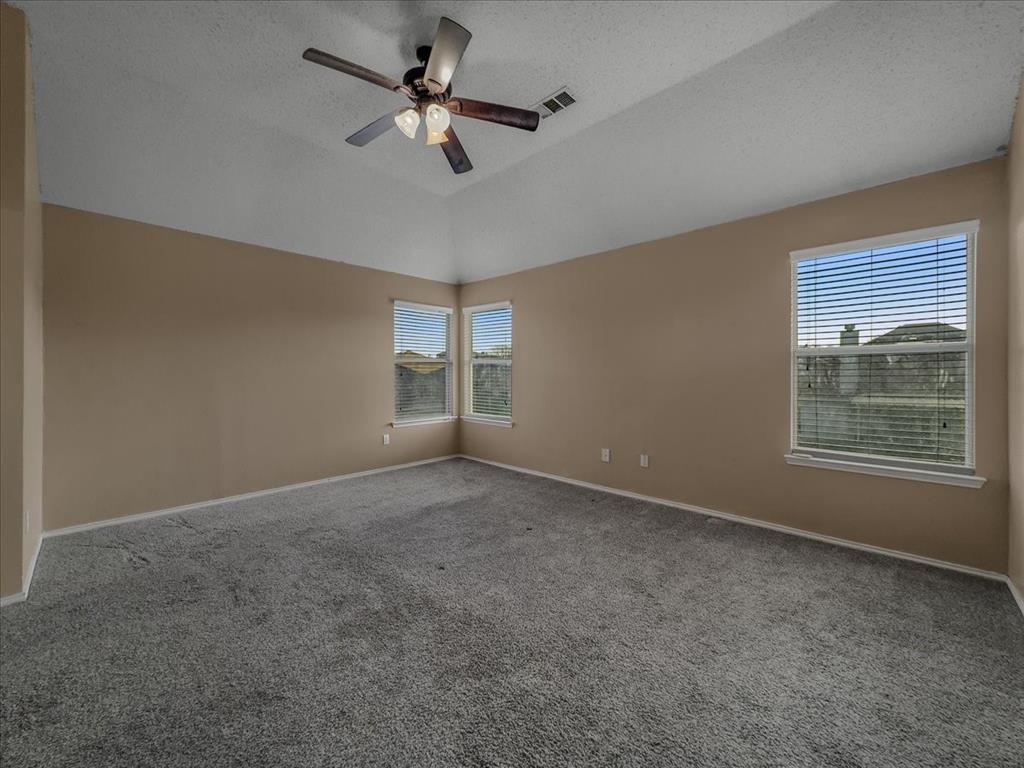 1119 Gaines Mills Road Grand Prairie, TX 75052 - Photo 22 of 29 a view of an empty room with a window