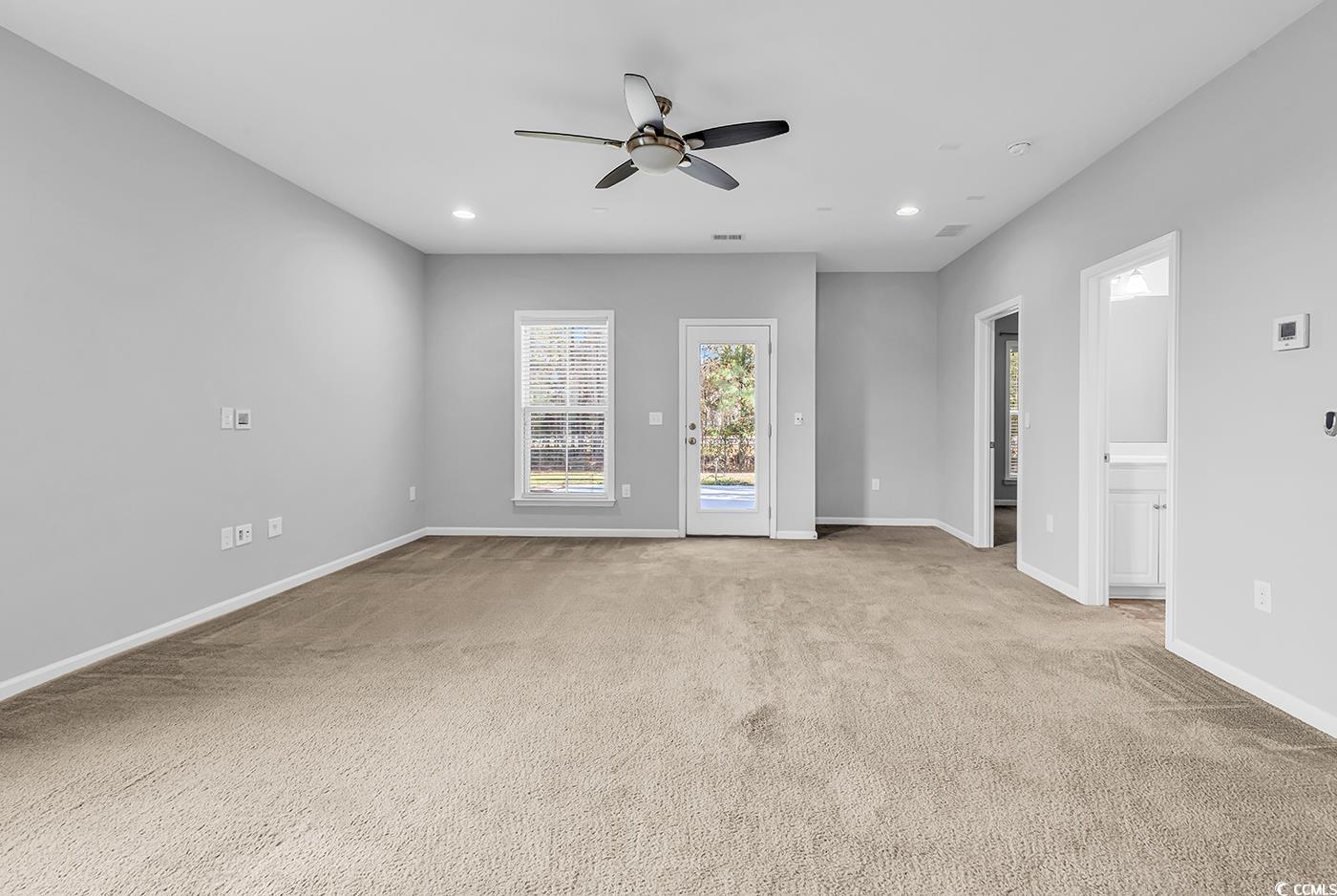 161 Splendor Circle Murrells Inlet, SC 29576 - Photo 22 of 37 Stairway with carpet floors and baseboards