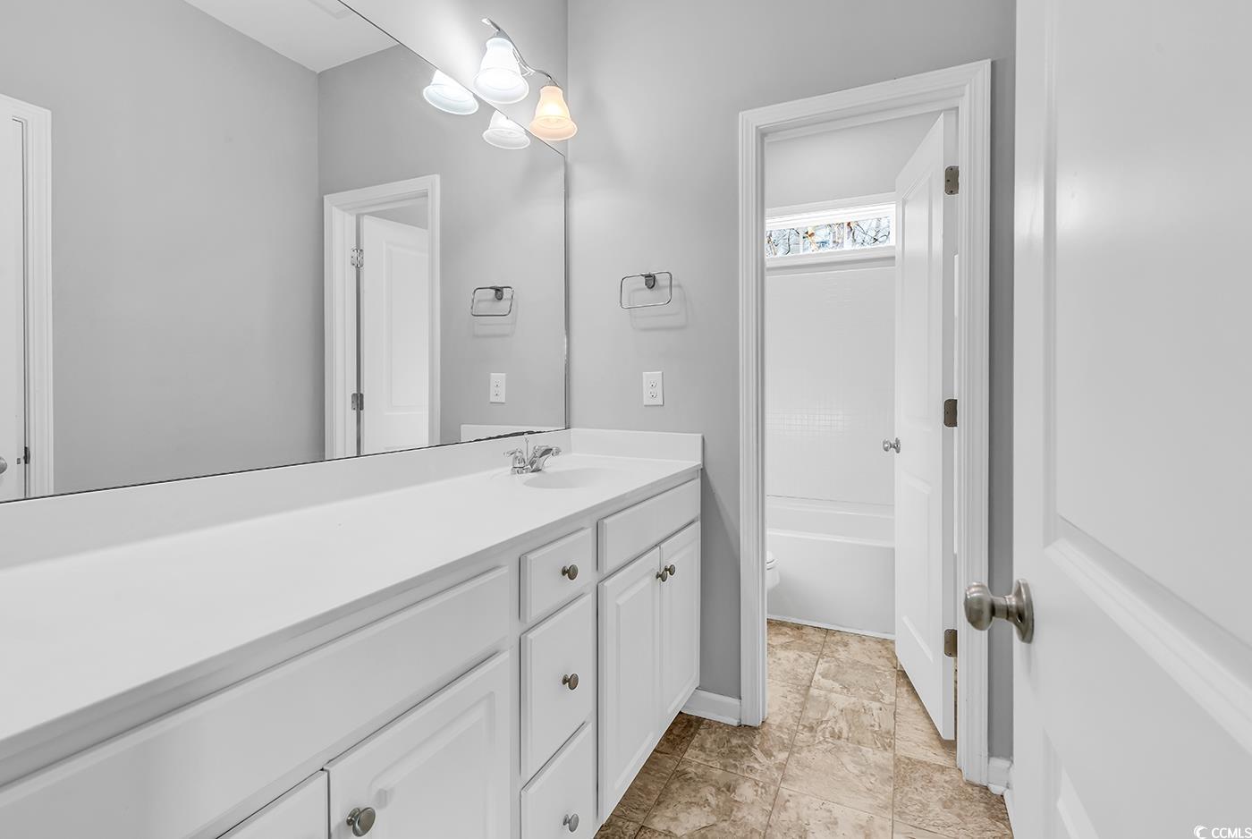 161 Splendor Circle Murrells Inlet, SC 29576 - Photo 25 of 37 Spare room with light carpet and ceiling fan