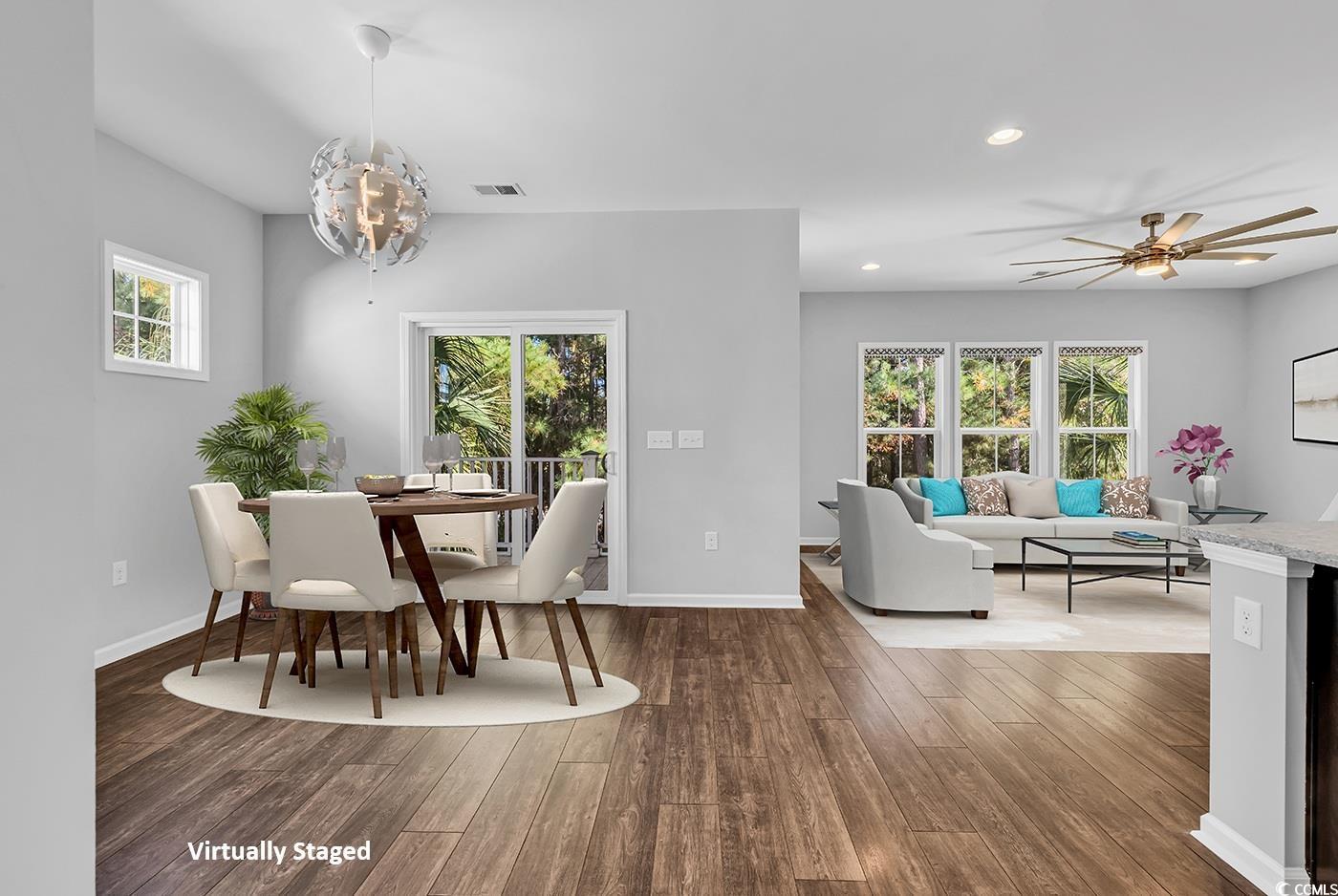 161 Splendor Circle Murrells Inlet, SC 29576 - Photo 3 of 37 Dining room with recessed lighting, dark wood-style flooring, ceiling fan, and a chandelier