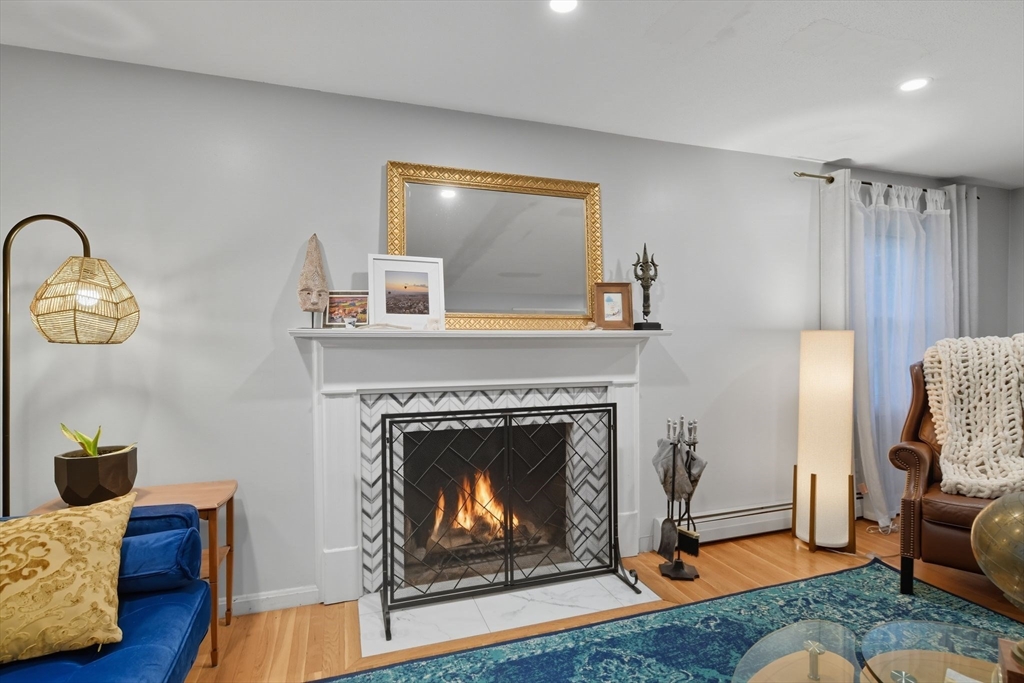 551 West Street Amherst, MA 01002 - Photo 19 of 39 a living room with furniture and a fireplace