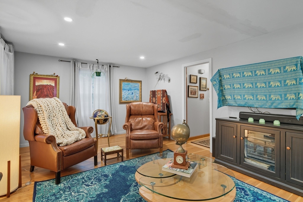 551 West Street Amherst, MA 01002 - Photo 20 of 39 a living room with furniture and a fireplace