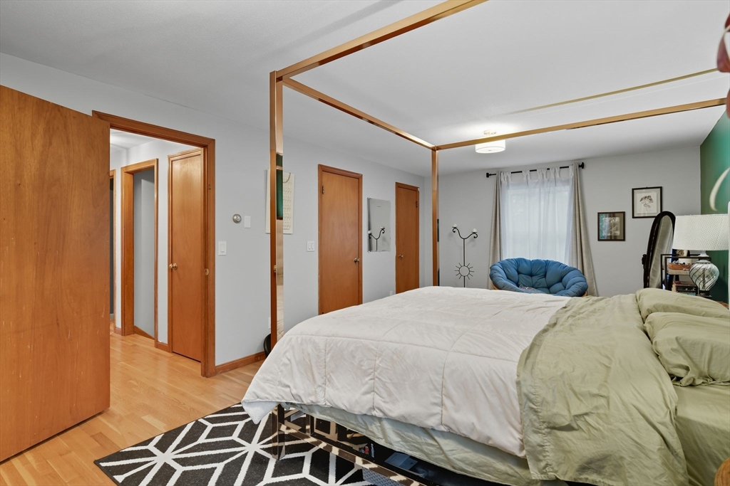 551 West Street Amherst, MA 01002 - Photo 25 of 39 a spacious bedroom with a bed and a dresser