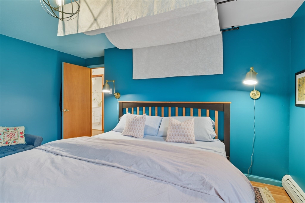 551 West Street Amherst, MA 01002 - Photo 28 of 39 a bedroom with a bed and a window