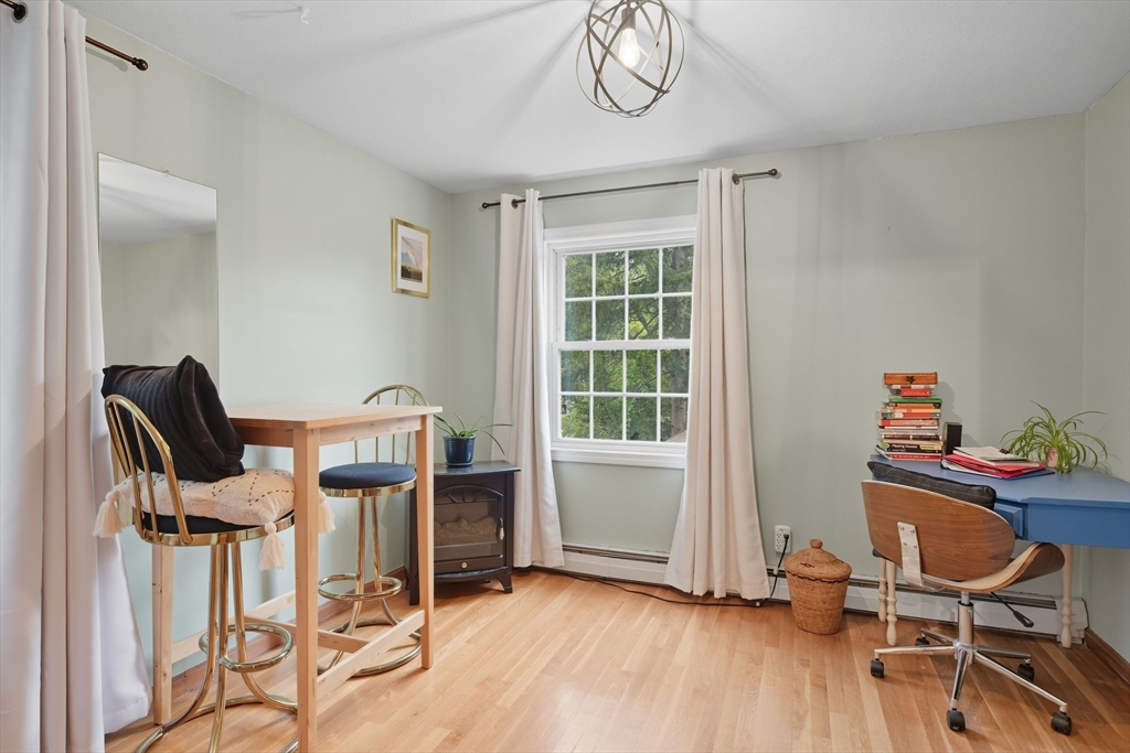 551 West Street Amherst, MA 01002 - Photo 29 of 39 a view of a workspace with furniture and a window