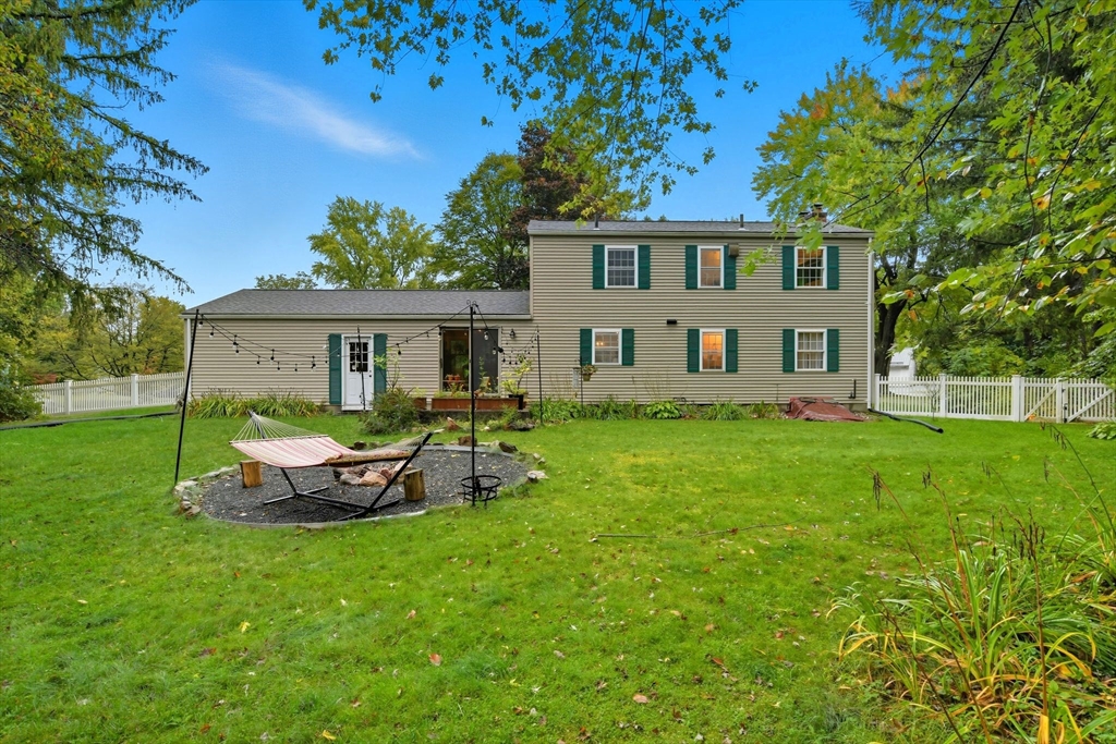 551 West Street Amherst, MA 01002 - Photo 35 of 39 a front view of a house with a garden