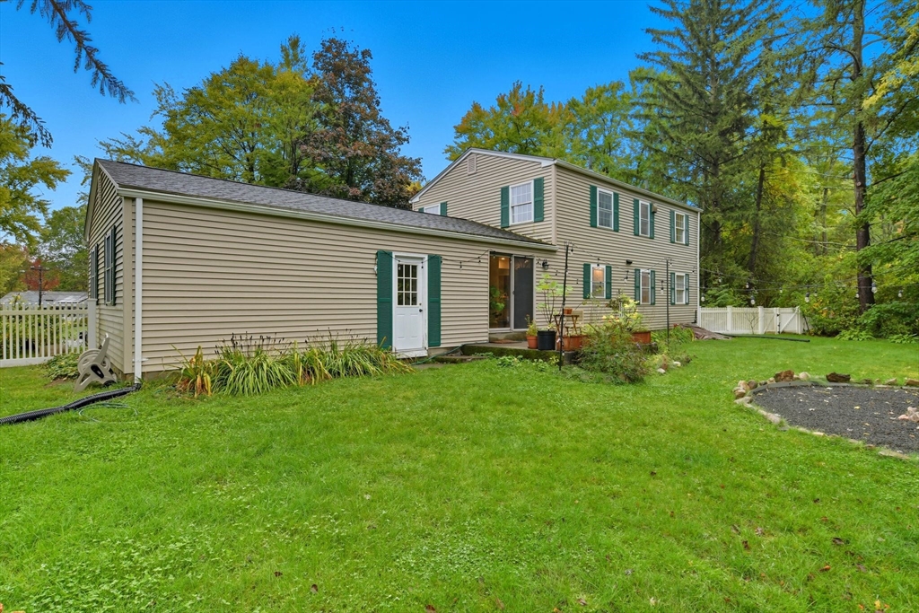 551 West Street Amherst, MA 01002 - Photo 36 of 39 a view of a house with a backyard