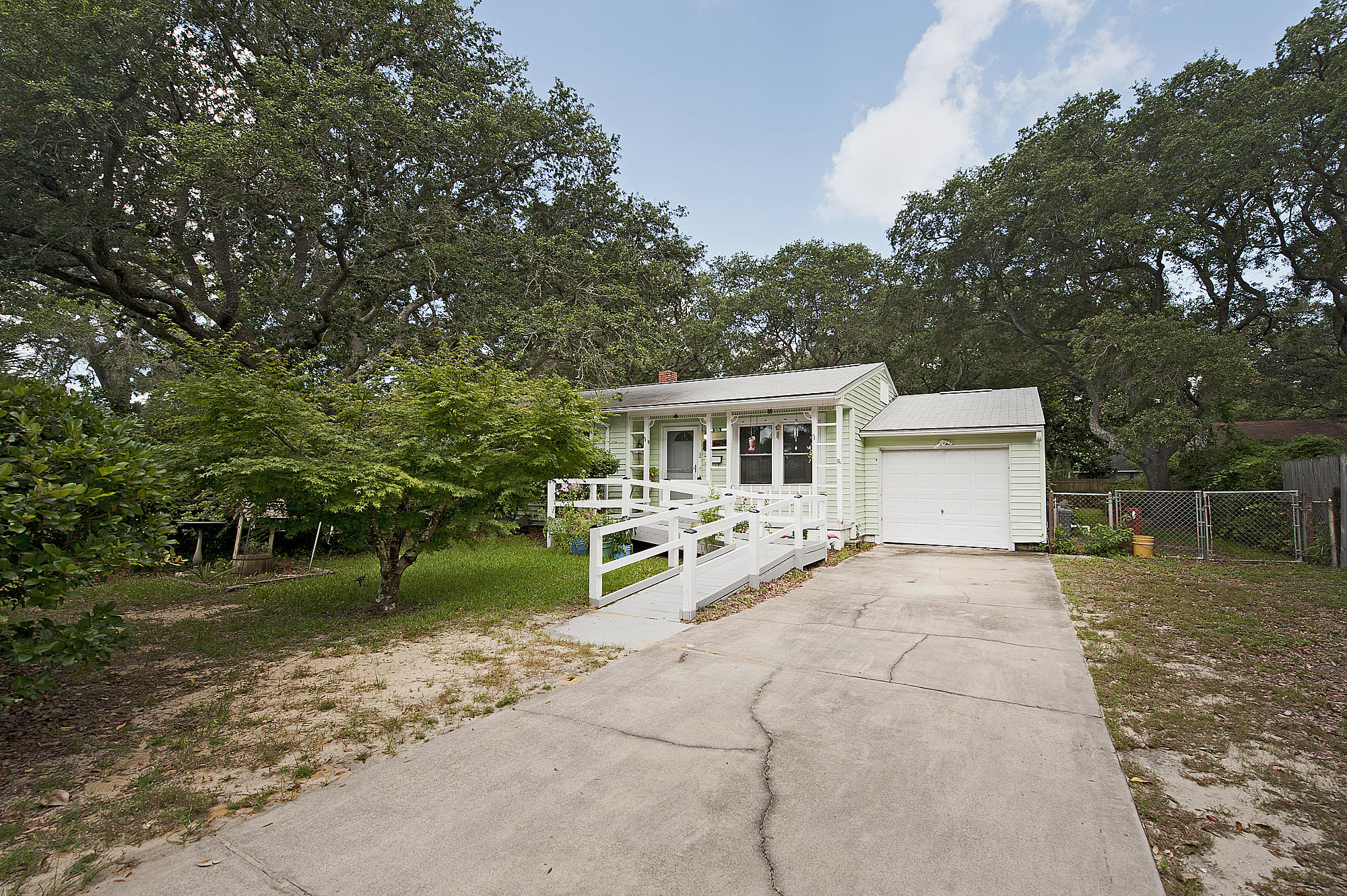 305 Okaloosa Road Northeast Fort Walton Beach, FL 32548 - Photo 3 of 26 a view of a house with backyard and trees