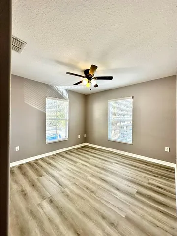 a bathroom with a sink a toilet and bathtub