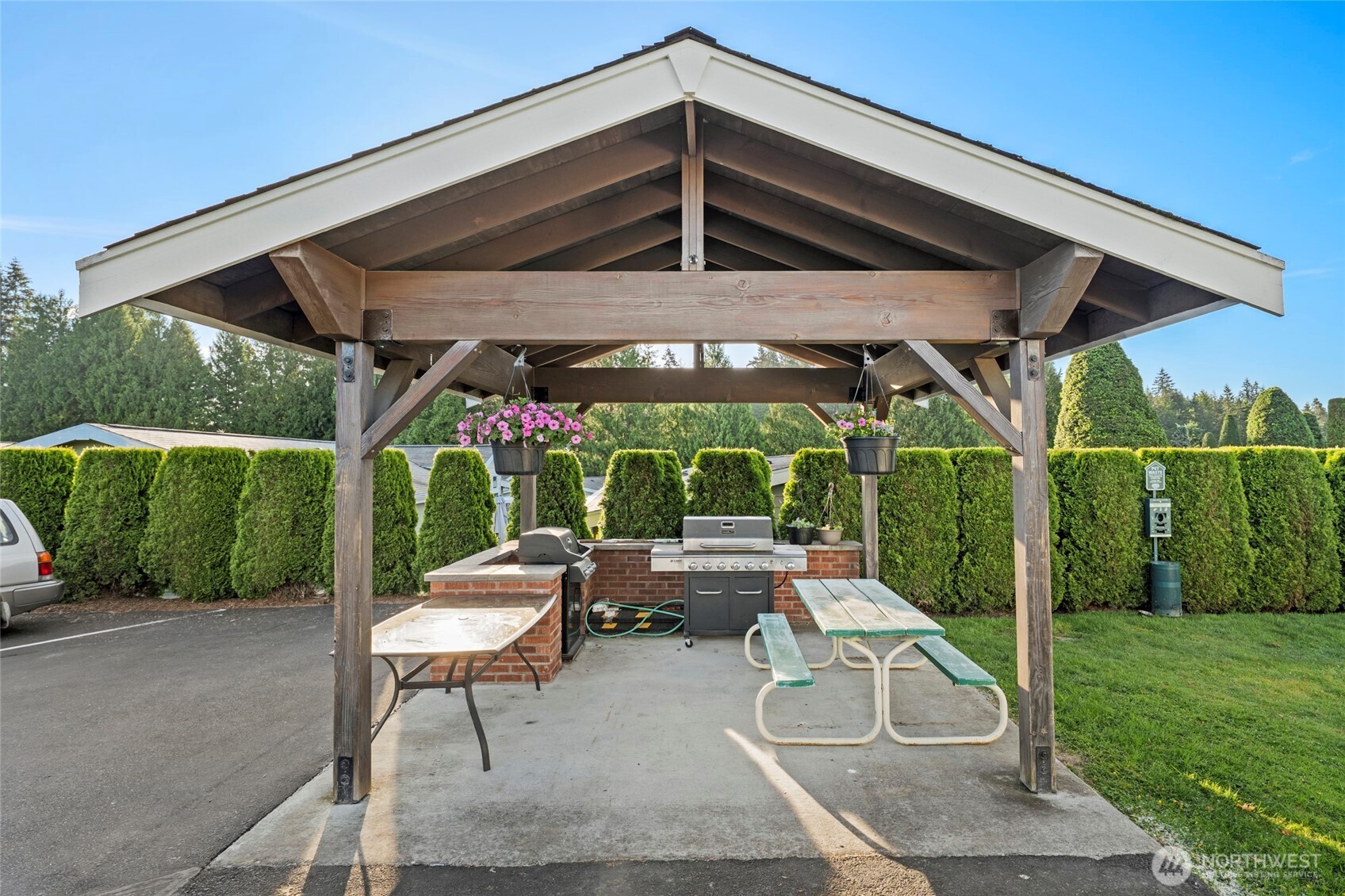 23825 15th Avenue Southeast, Unit 108 Bothell, WA 98021 - Photo 25 of 39 a patio with table and chairs