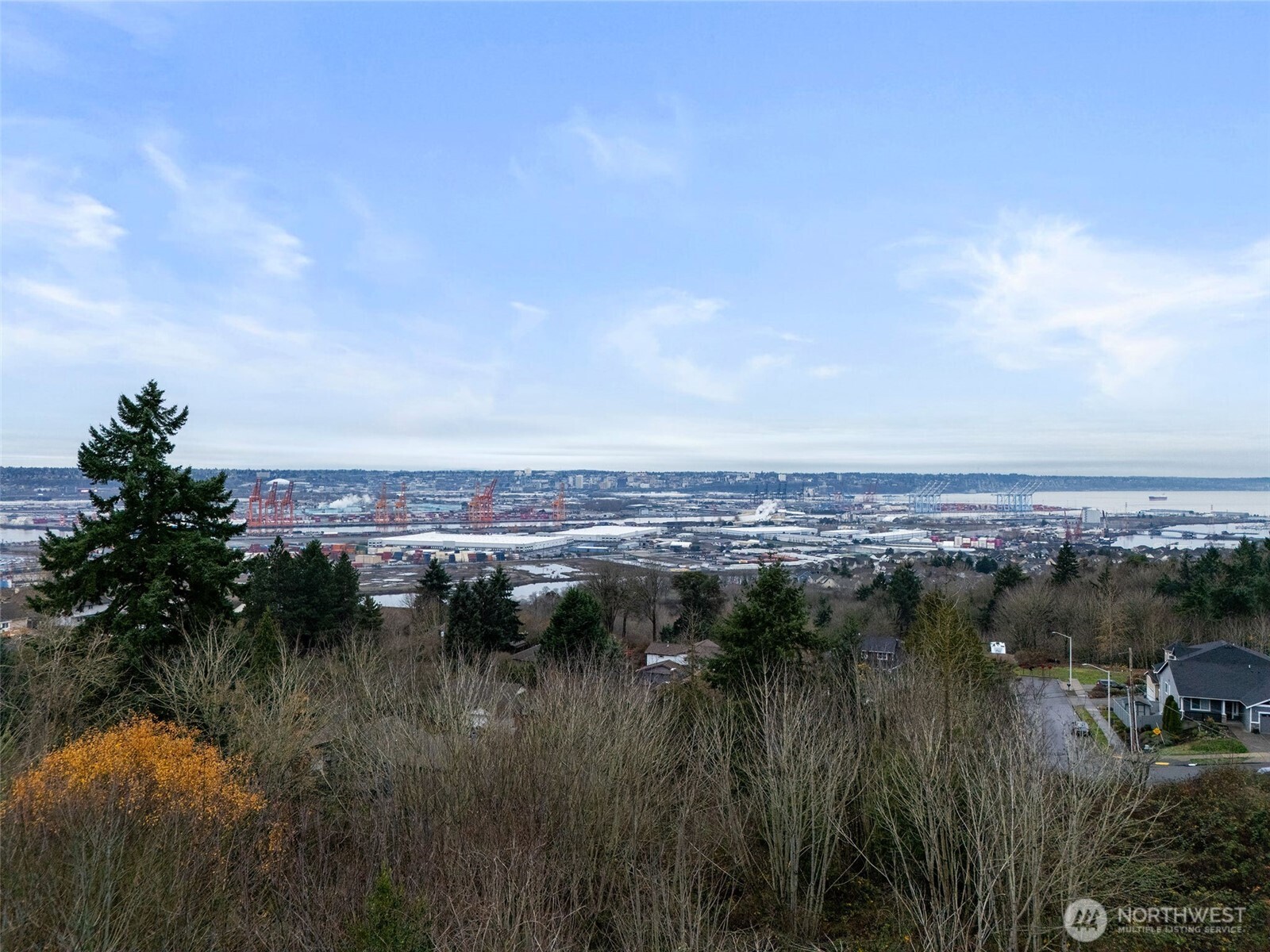 63 19th Street Northeast Tacoma, WA 98422 - Photo 16 of 22 a view of city and a lake