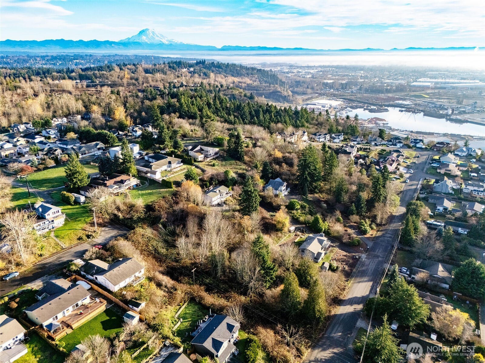 63 19th Street Northeast Tacoma, WA 98422 - Photo 2 of 22 a view of a city with ocean view