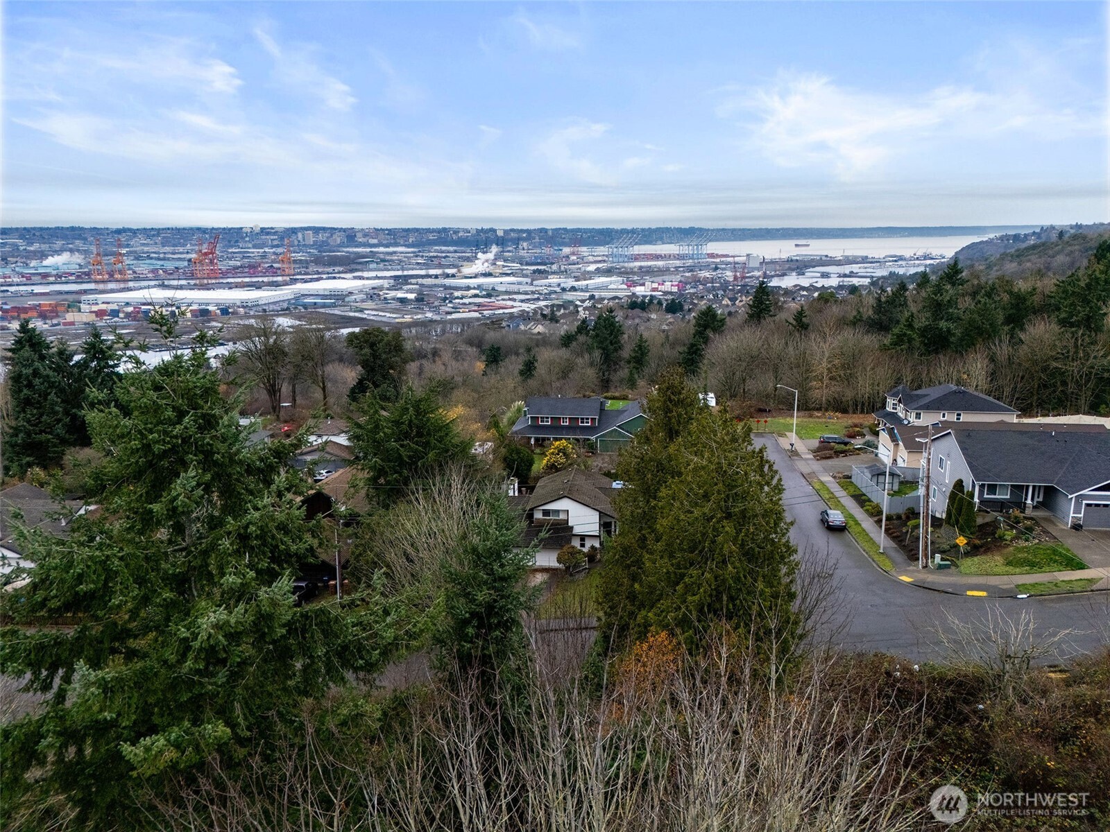 63 19th Street Northeast Tacoma, WA 98422 - Photo 22 of 22 a view of a lake in middle of the town