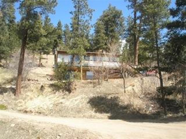 32677 Little Cub Road Evergreen, CO 80439 - Photo 1 of 1 a view of backyard of house