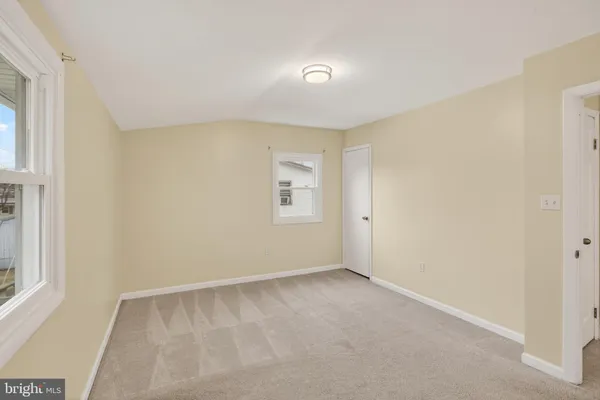 a view of a workspace with furniture