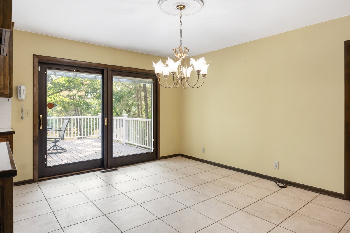 1012 Berwick Trail Madison, TN 37115 - Photo 12 of 35 a view of a room with a chandelier and large windows
