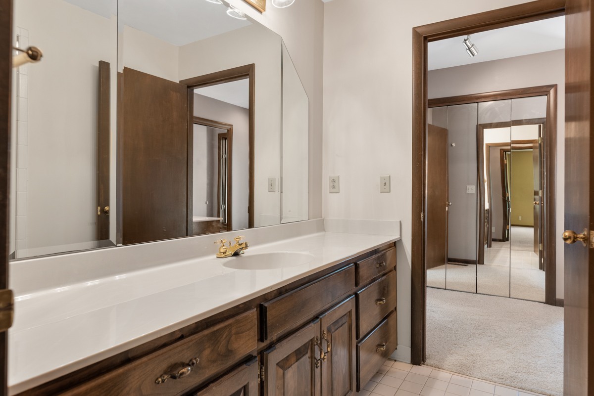 1012 Berwick Trail Madison, TN 37115 - Photo 15 of 35 a bathroom with a sink a vanity and a mirror