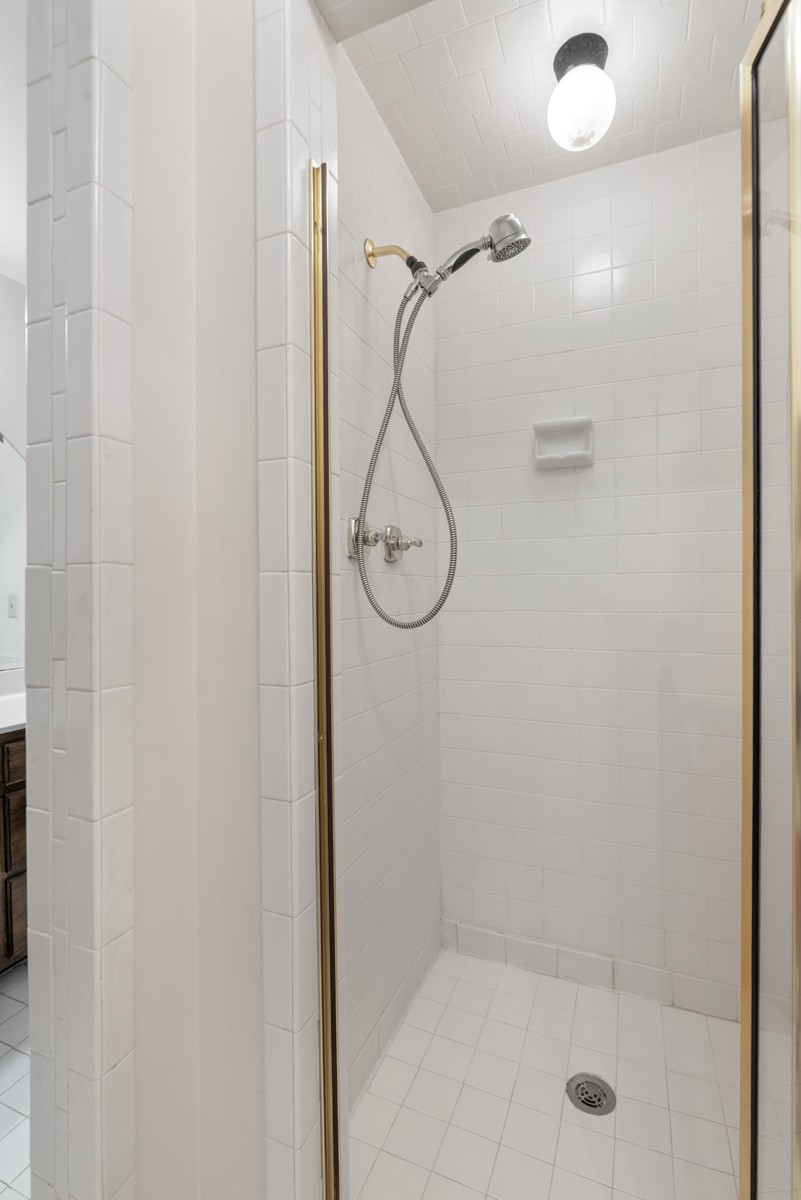 1012 Berwick Trail Madison, TN 37115 - Photo 16 of 35 a bathroom with a glass shower door