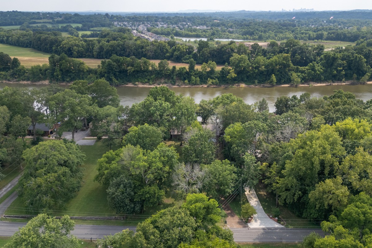 1012 Berwick Trail Madison, TN 37115 - Photo 35 of 35 an aerial view of green landscape with trees houses and lake view