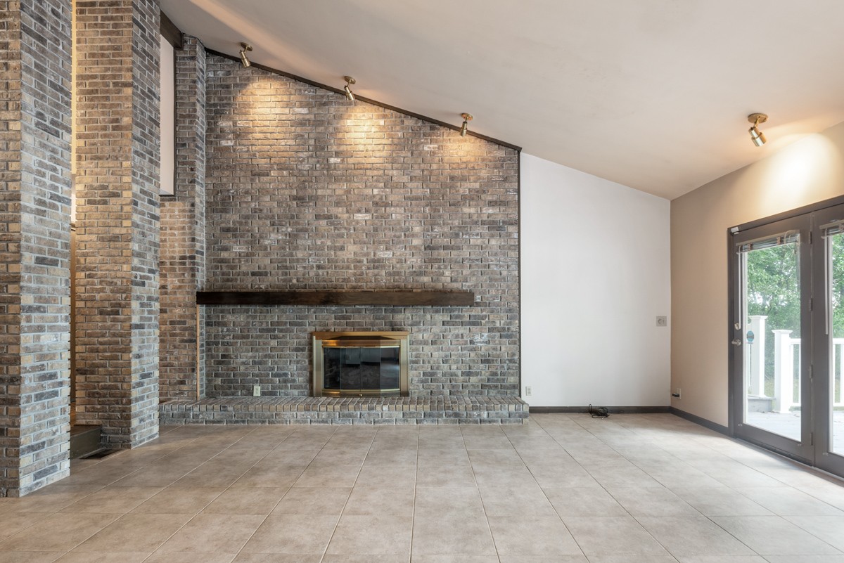 1012 Berwick Trail Madison, TN 37115 - Photo 6 of 35 a view of empty room with a fireplace