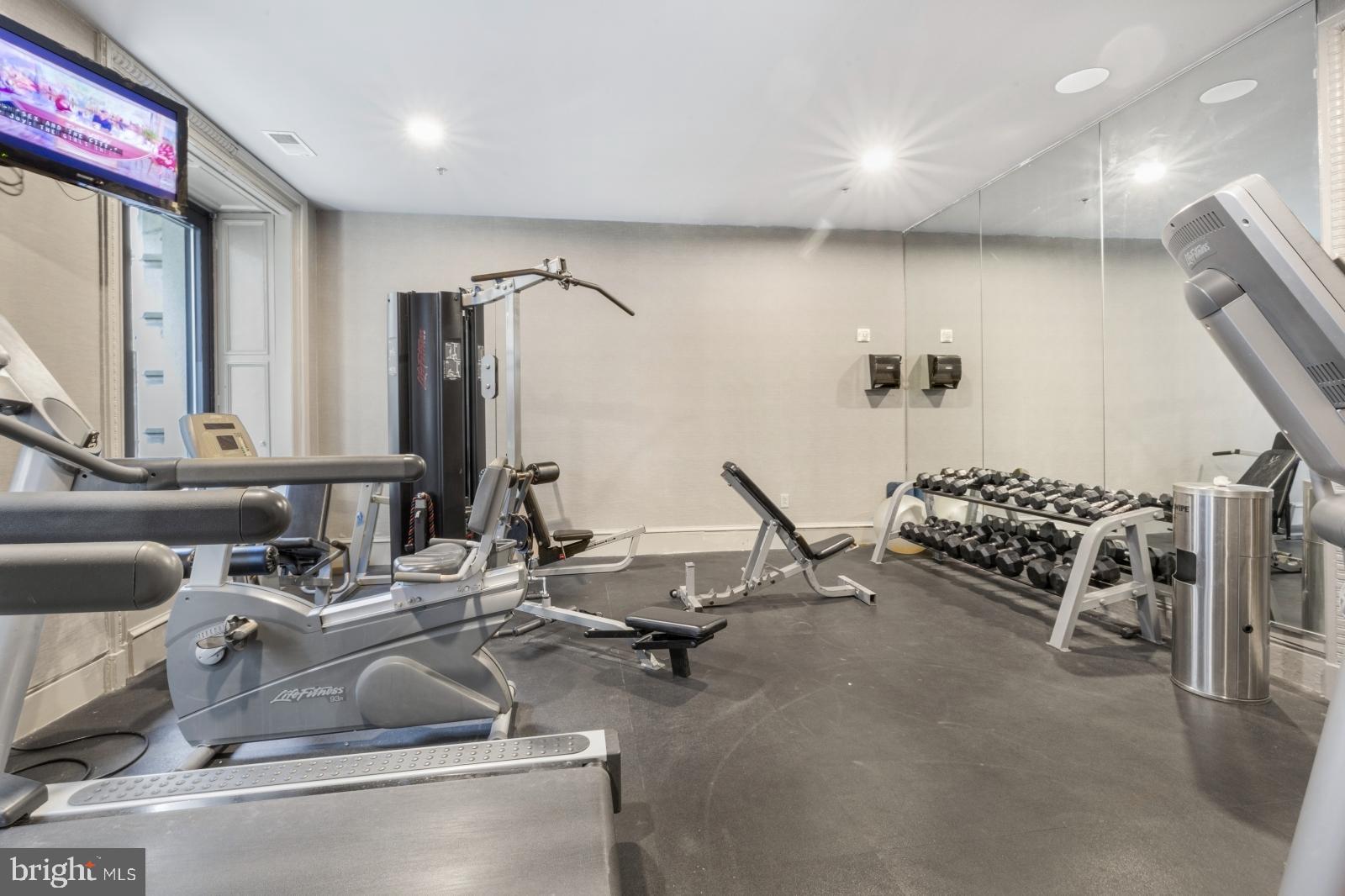 1001 Chestnut Street, Unit 903W Philadelphia, PA 19103 - Photo 13 of 21 a room with gym equipment