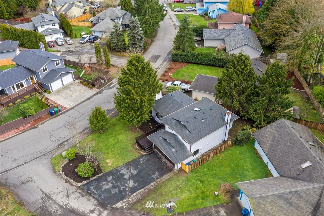 1624 174th Place Southeast Bothell, WA 98012 - Photo 30 of 36 an aerial view of a house with garden space and street view