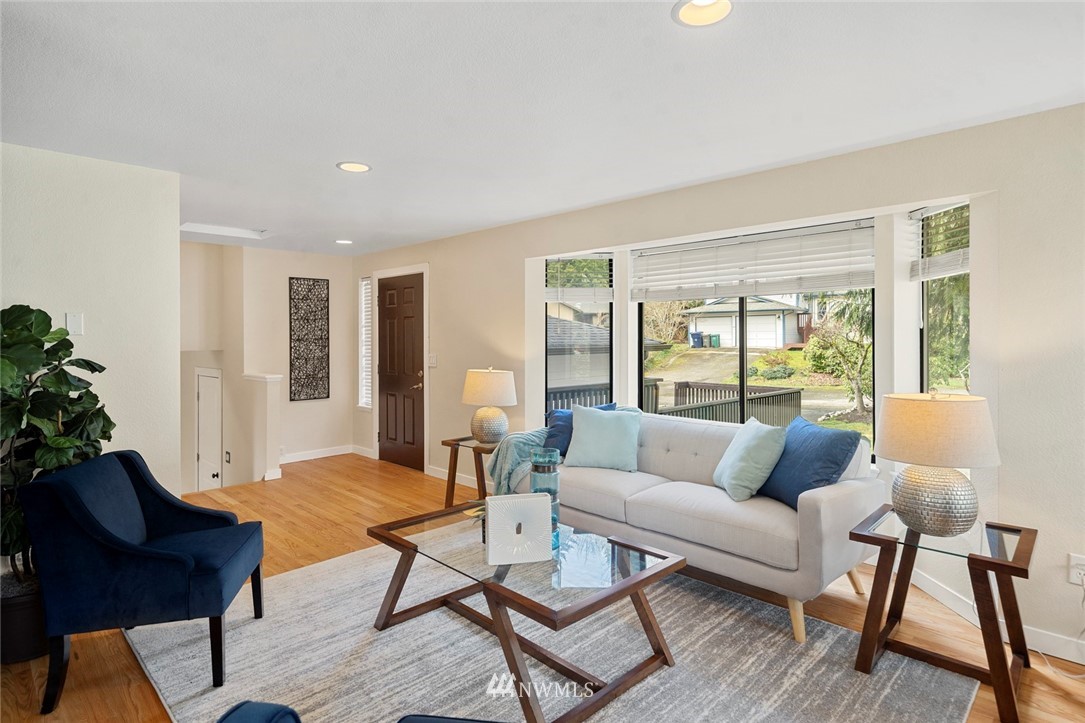 1624 174th Place Southeast Bothell, WA 98012 - Photo 5 of 36 a living room with furniture and a large window