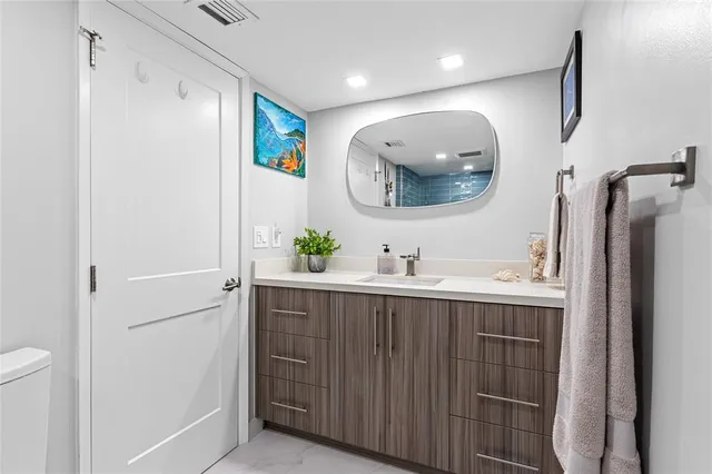 an empty room with windows and entrance