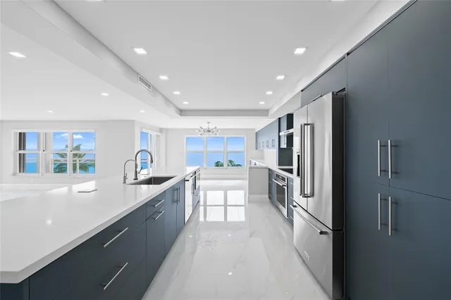 a living room with fireplace furniture and a table