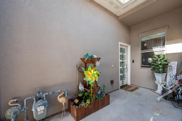 a view of sitting area with furniture and a potted plant