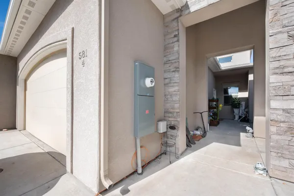 a view of a bedroom from a corridor