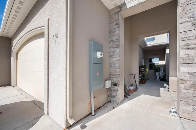 a view of a bedroom from a corridor
