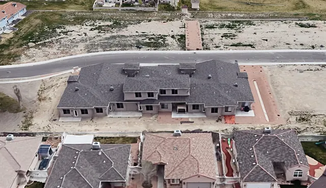 with aerial view of multiple houses with outdoor space