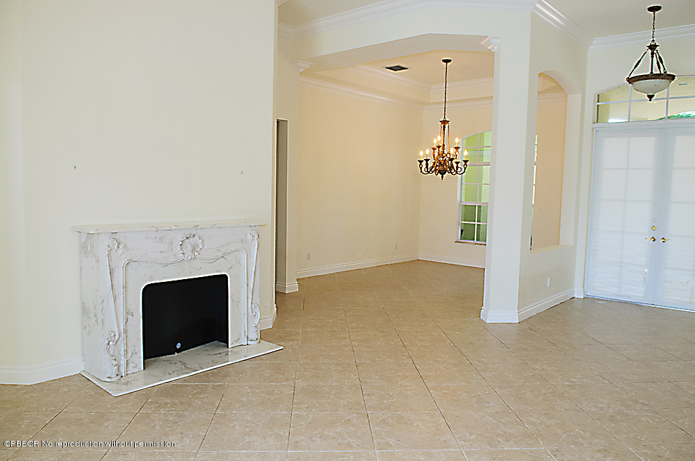 1211 Pine Point Road Riviera Beach, FL 33404 - Photo 8 of 15 Living room with fireplace