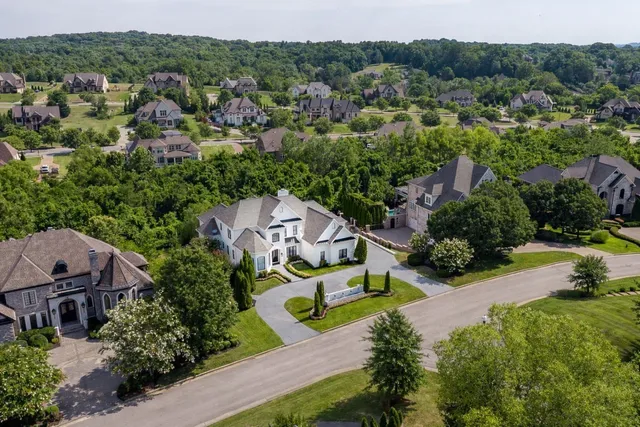 an aerial view of a house with a garden