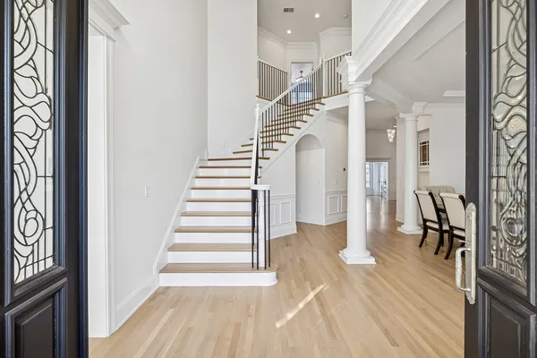 a living room with furniture a window and a table