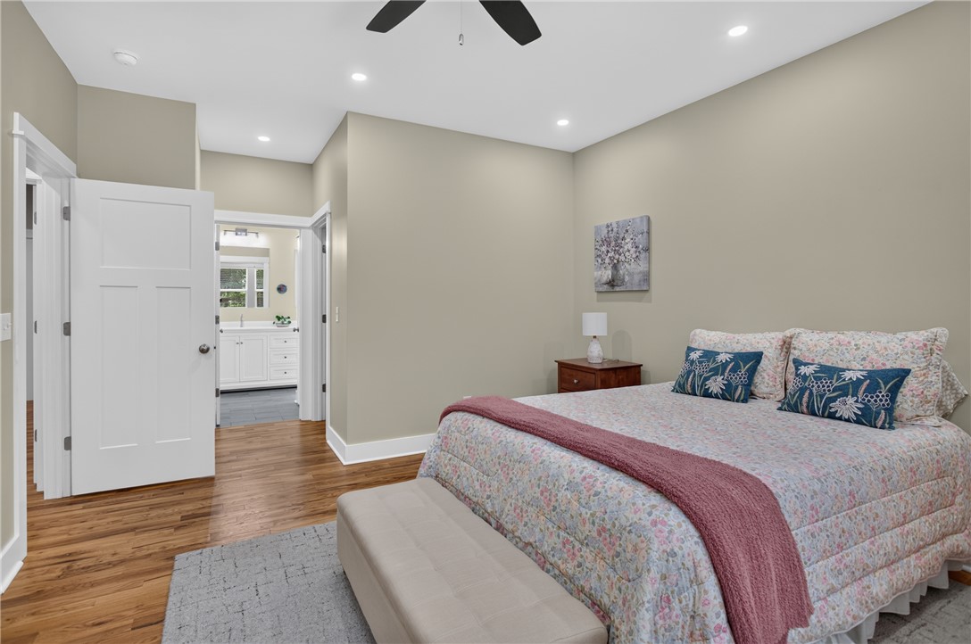 405 Pawnee Drive Walhalla, SC 29691 - Photo 10 of 36 Hardwood floors and soft recessed lighting create a peaceful retreat within this personal space.