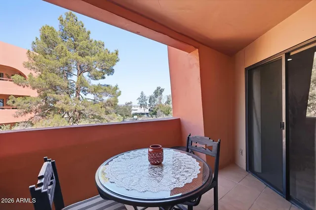 a kitchen with a sink stainless steel appliances and cabinets