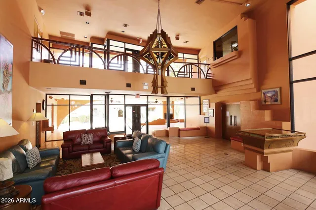 a view of a swimming pool with a patio