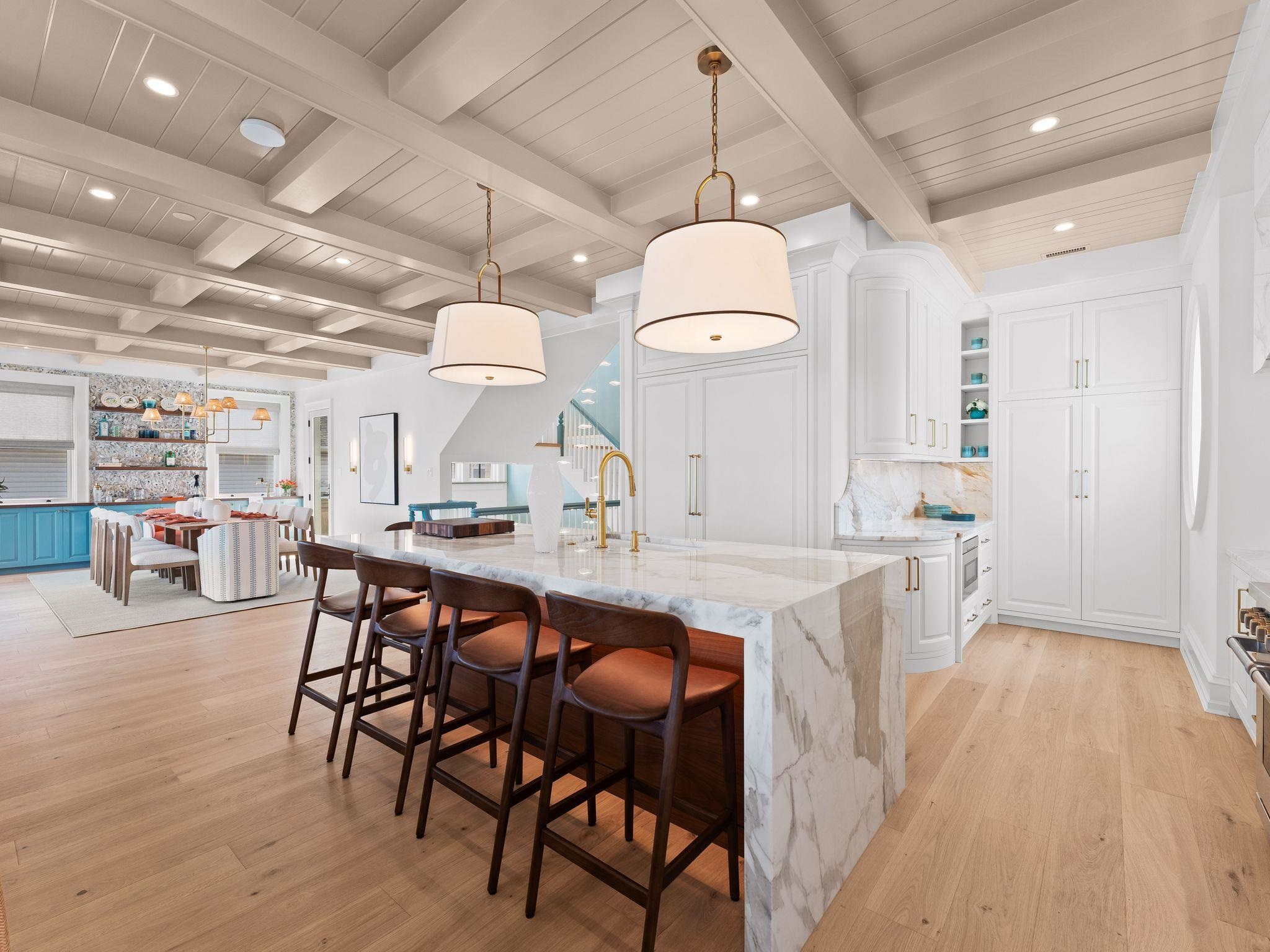12 East Newcastle Road Ocean City, NJ 08226 - Photo 20 of 50 a large kitchen with a table and chairs