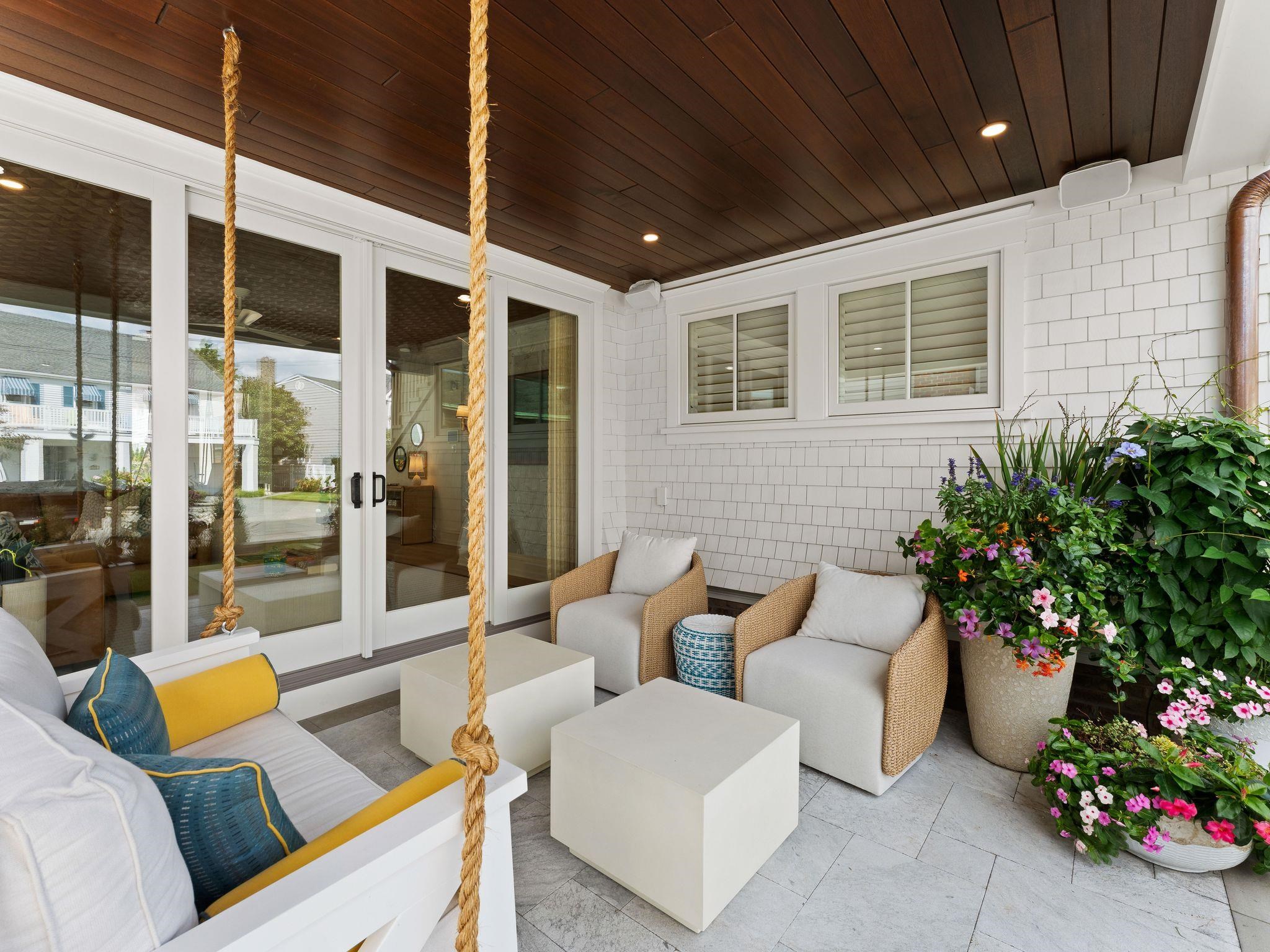 12 East Newcastle Road Ocean City, NJ 08226 - Photo 7 of 50 a outdoor living space with furniture and potted plants